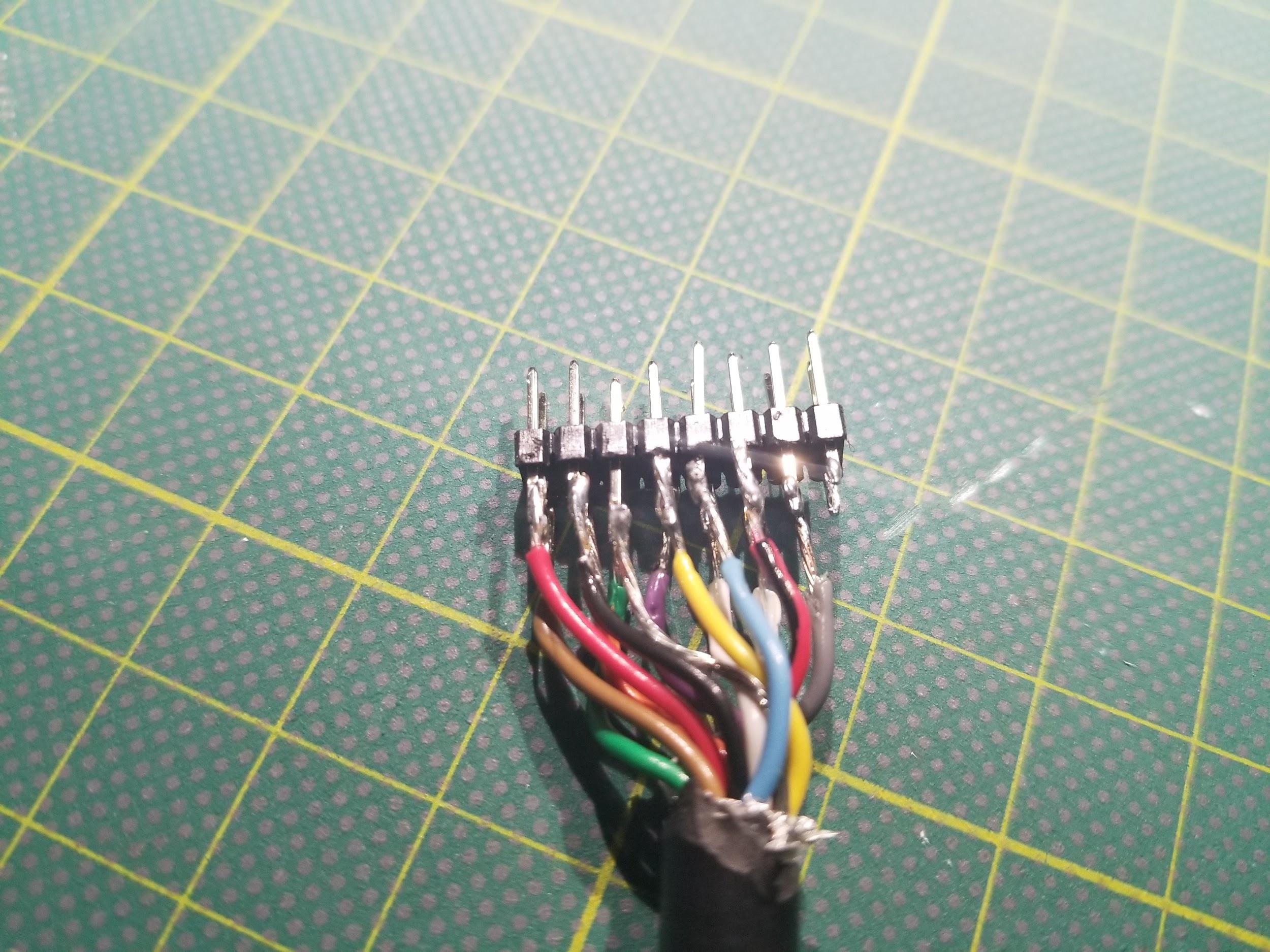 Amateurish job of soldering cable wires to header pins